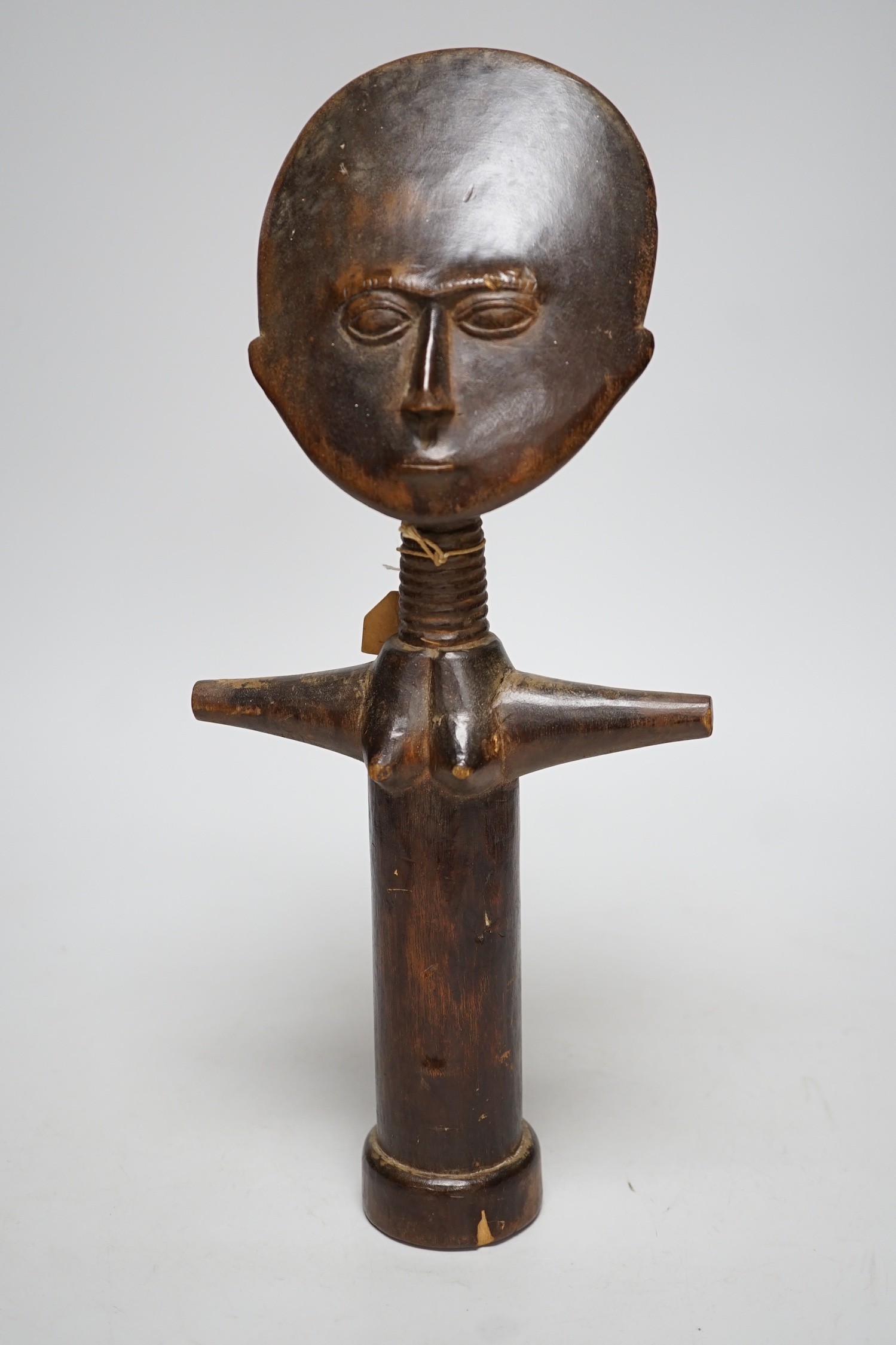 A wooden fertility figure, Ashanti, 34.5cm